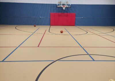 steel building with basketball court