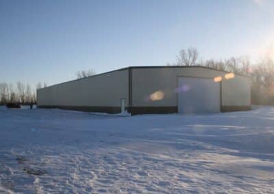 large light yellow and brown steel barn
