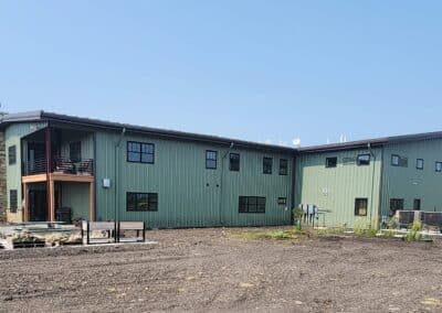 Large green steel house